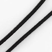 Load image into Gallery viewer, BeadsBalzar Beads &amp; Crafts BLACK (EC1367B) (EC1367-X) Elastic Cord, with Fibre Outside and Rubber Inside, Black, 4.5~5.0mm (5 MTRS)
